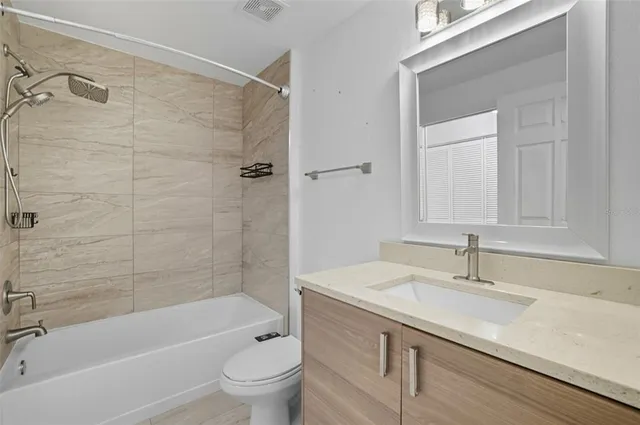 a view of an outdoor dining space with a lake view