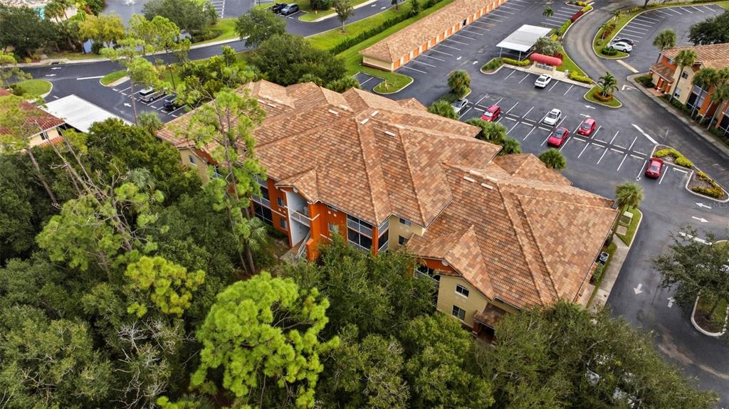 6401 Aragon Way, Unit 103 Fort Myers, FL 33966 - Photo 34 of 40 an aerial view of houses with yard