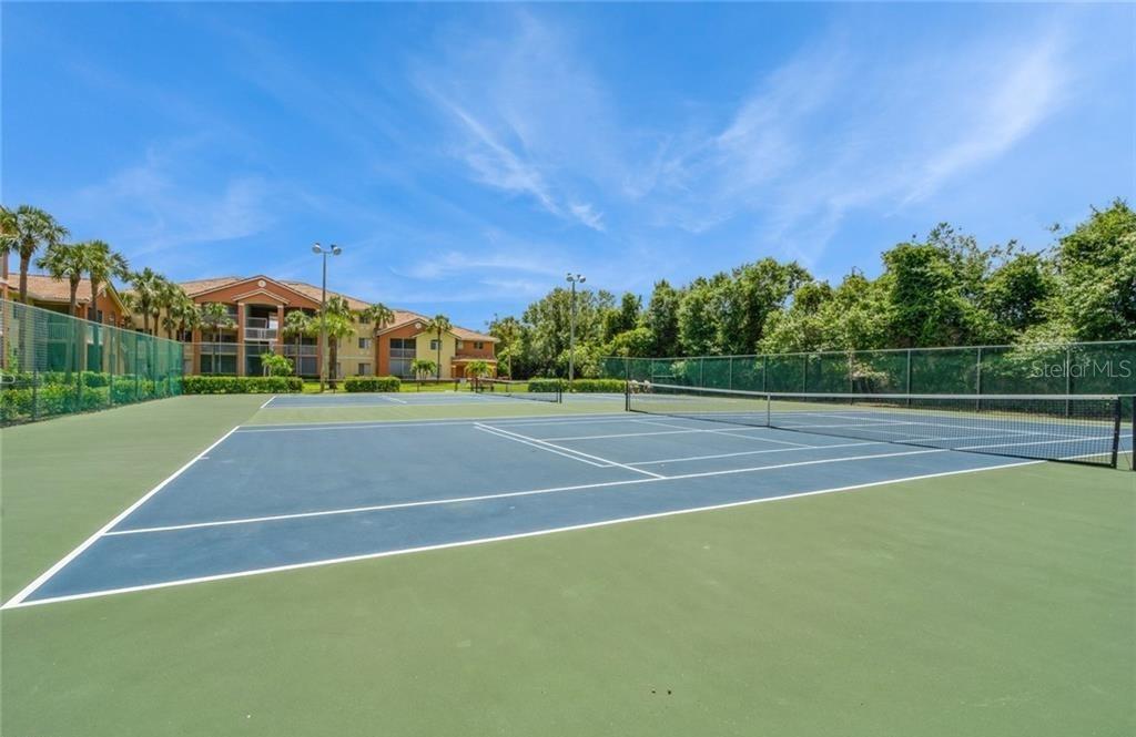 6401 Aragon Way, Unit 103 Fort Myers, FL 33966 - Photo 38 of 40 a view of a tennis court