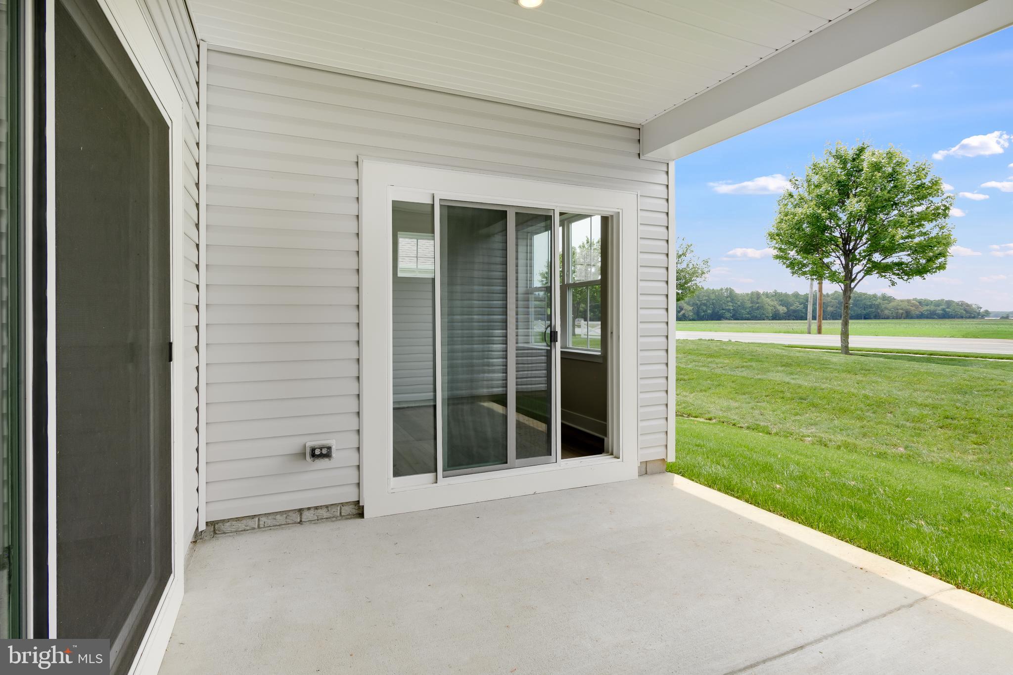 207 Mariners Circle Milton, DE 19968 - Photo 27 of 42 a view of a backyard with garden