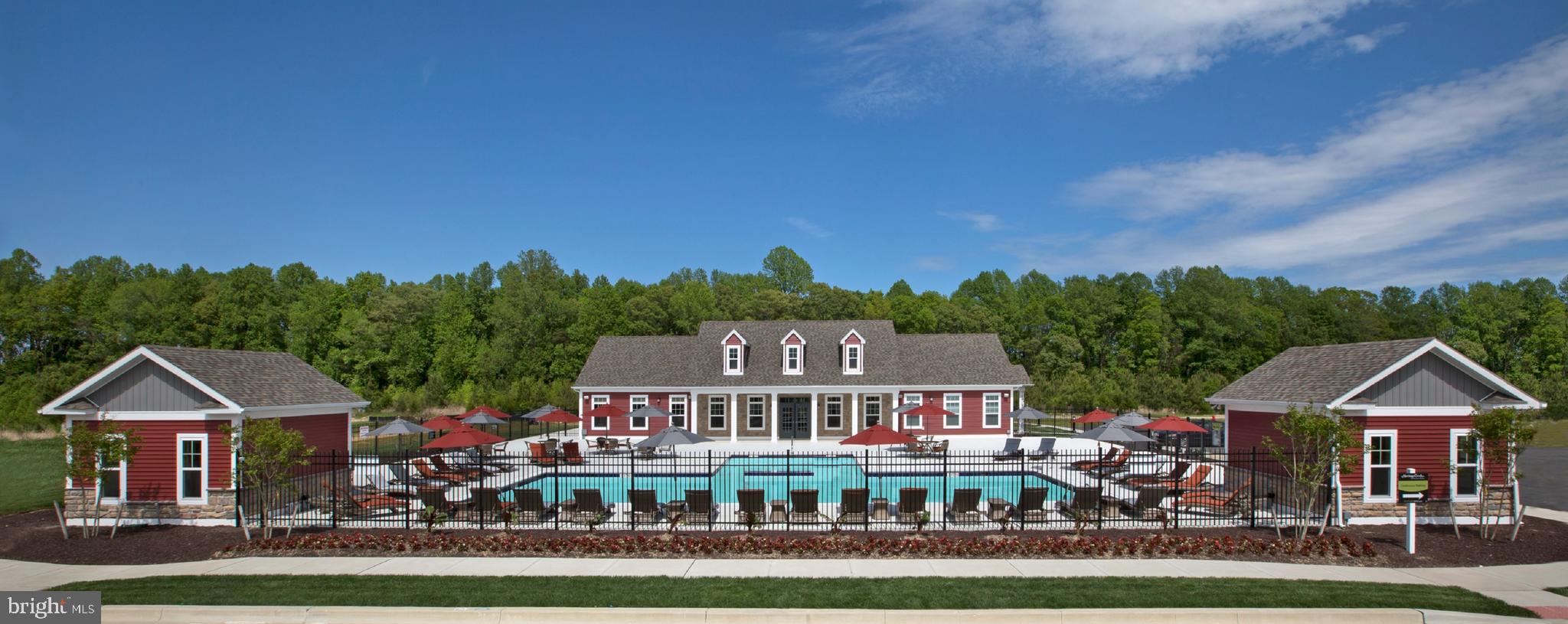 207 Mariners Circle Milton, DE 19968 - Photo 31 of 42 a front view of a house with a yard