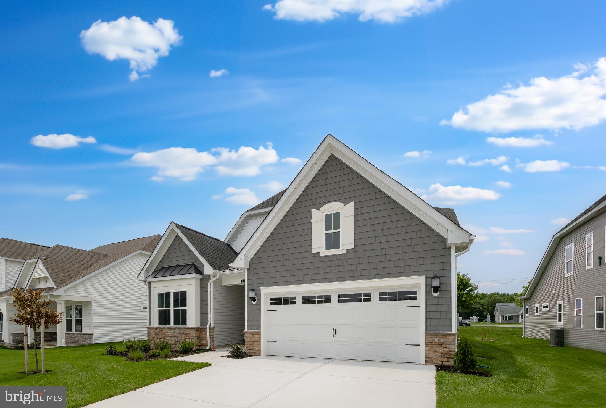 207 Mariners Circle Milton, DE 19968 - Photo 42 of 42 a view of a house with a yard