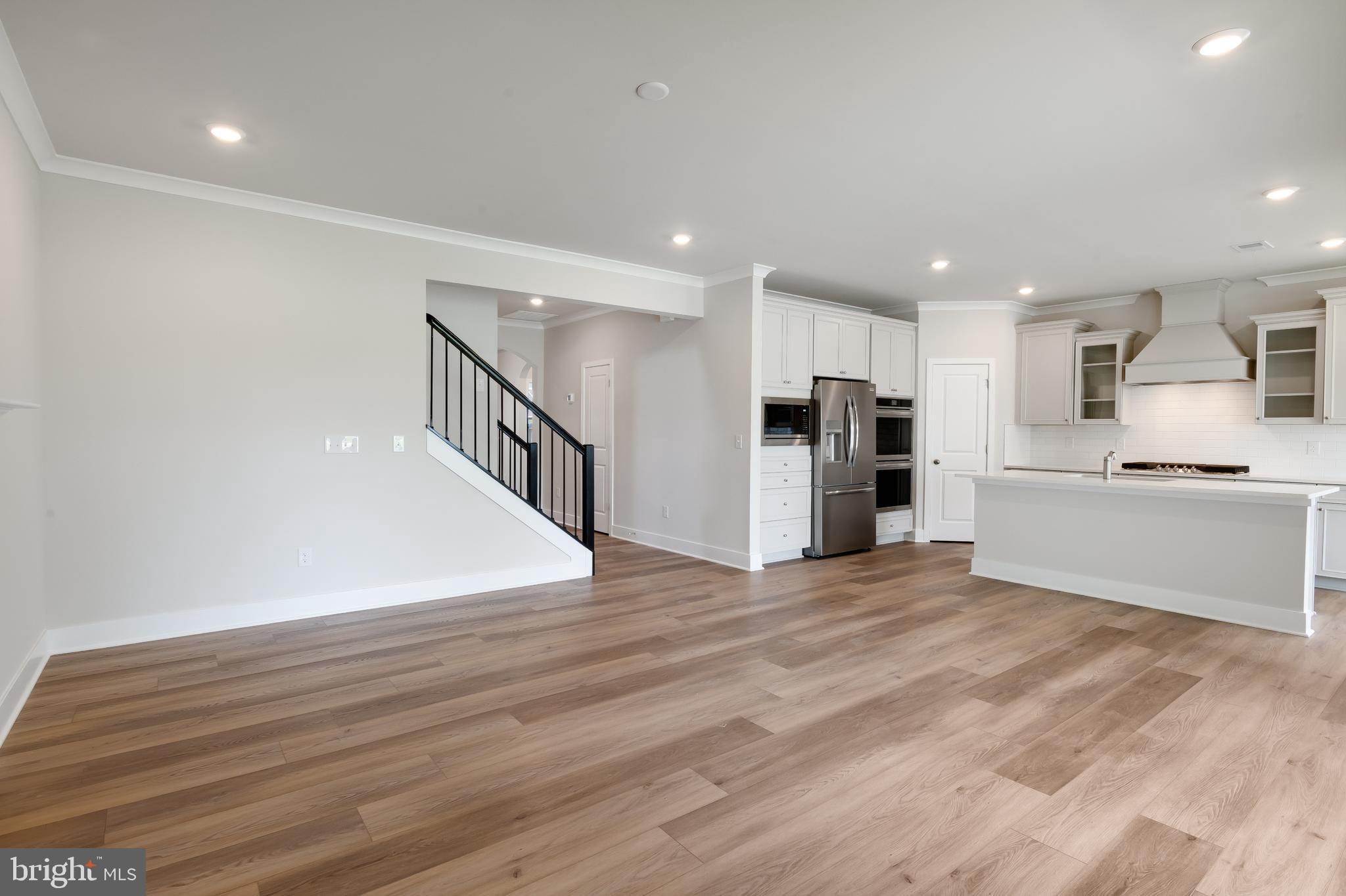 207 Mariners Circle Milton, DE 19968 - Photo 9 of 42 a view of kitchen with wooden floor