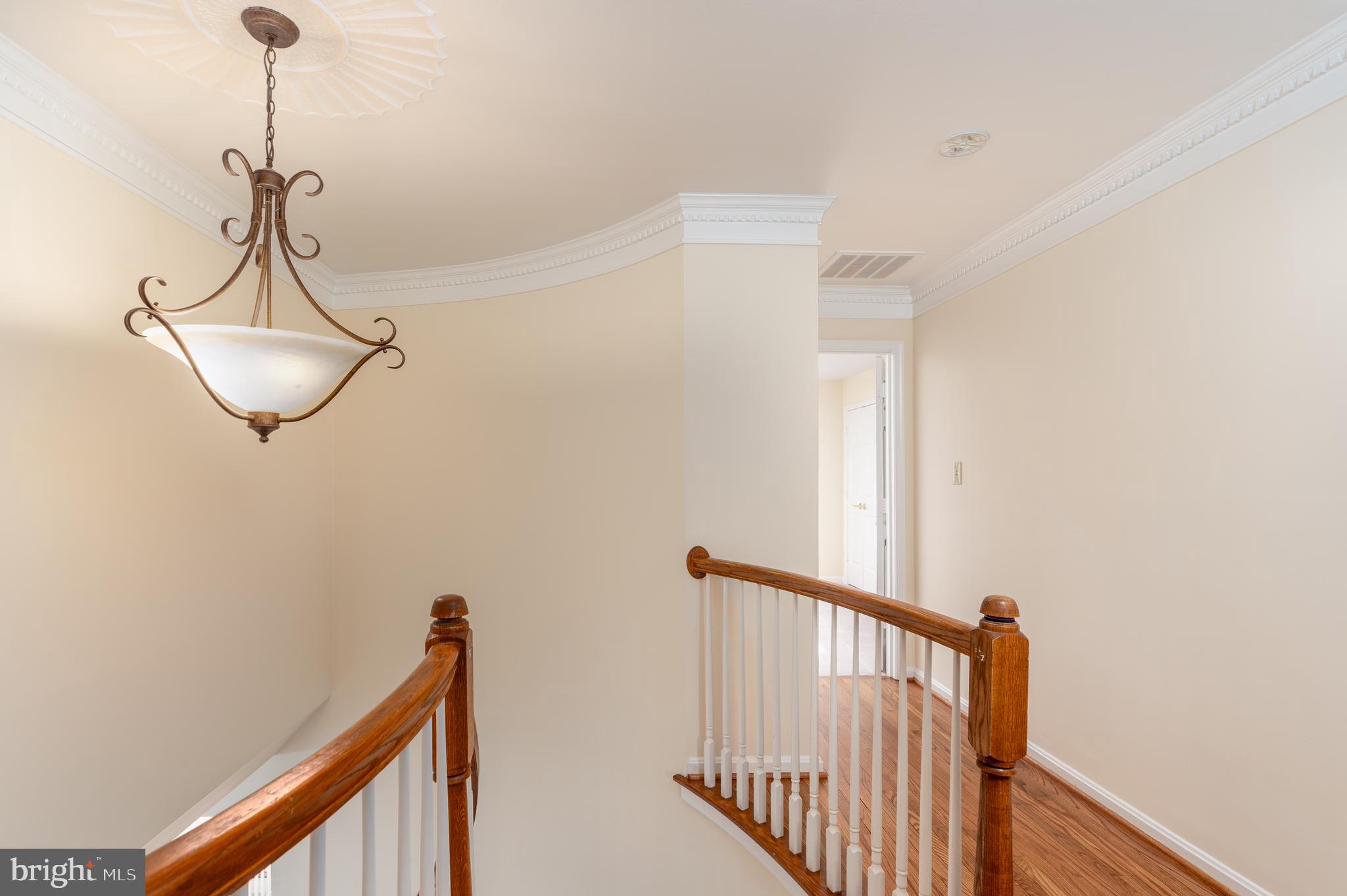 8010 Merry Oaks Lane Vienna, VA 22182 - Photo 11 of 33 a view of a hallway with windows