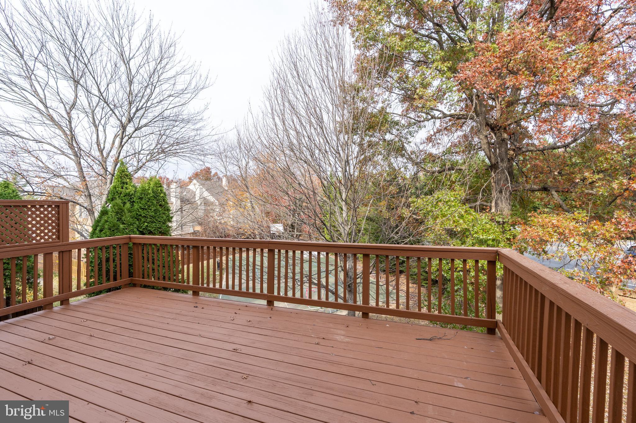 8010 Merry Oaks Lane Vienna, VA 22182 - Photo 13 of 33 a view of deck with wooden floor and fence