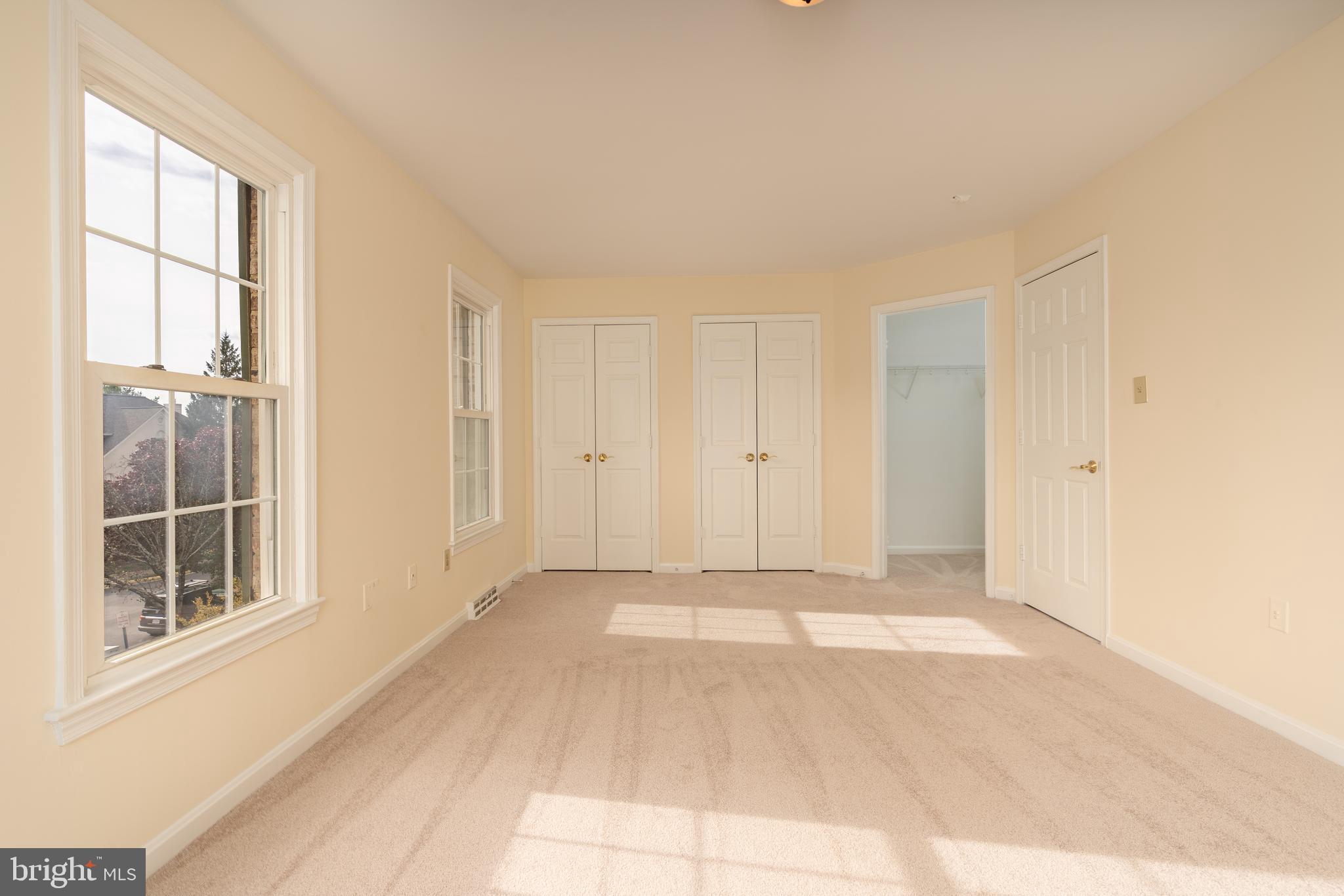 8010 Merry Oaks Lane Vienna, VA 22182 - Photo 19 of 33 a view of an empty room with a window