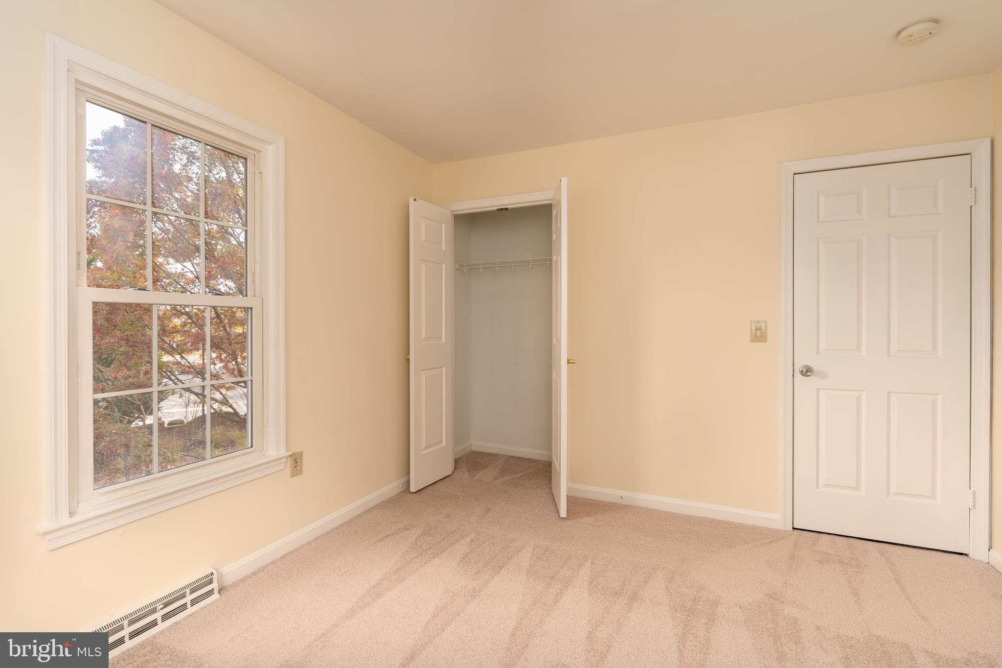 8010 Merry Oaks Lane Vienna, VA 22182 - Photo 22 of 33 an empty room with windows