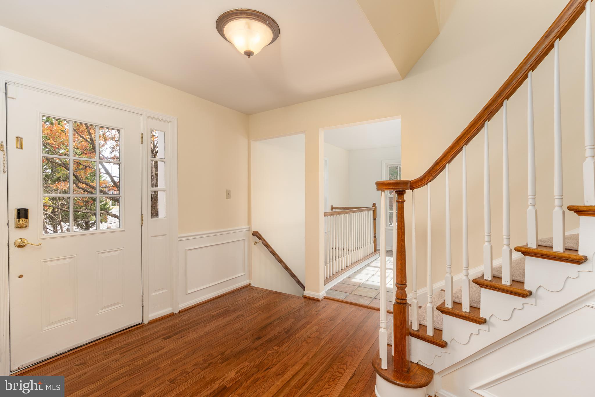8010 Merry Oaks Lane Vienna, VA 22182 - Photo 10 of 33 a view of front door with hallway