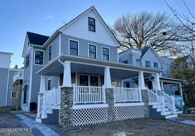 a view of a brick house with a large windows