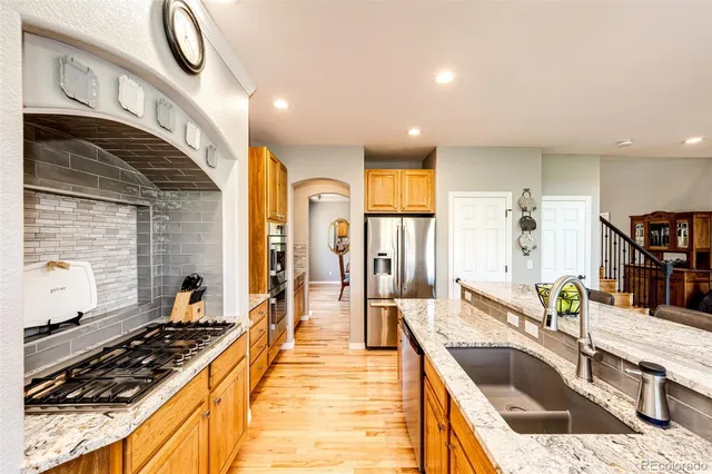 a view of livingroom with furniture wooden floor and windows