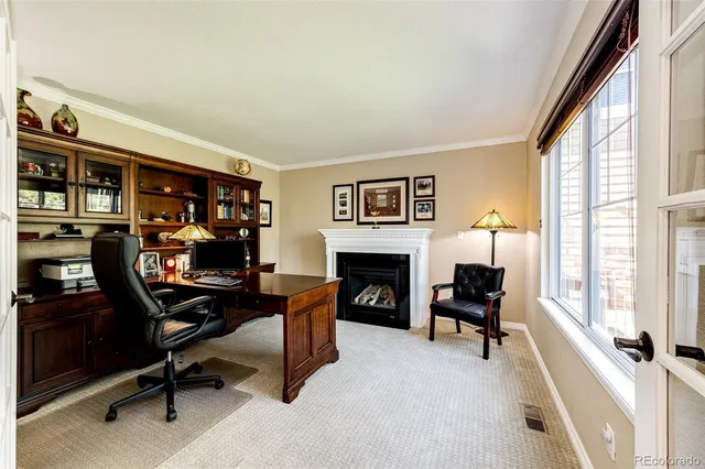 a view of a balcony with wooden floor and outdoor space