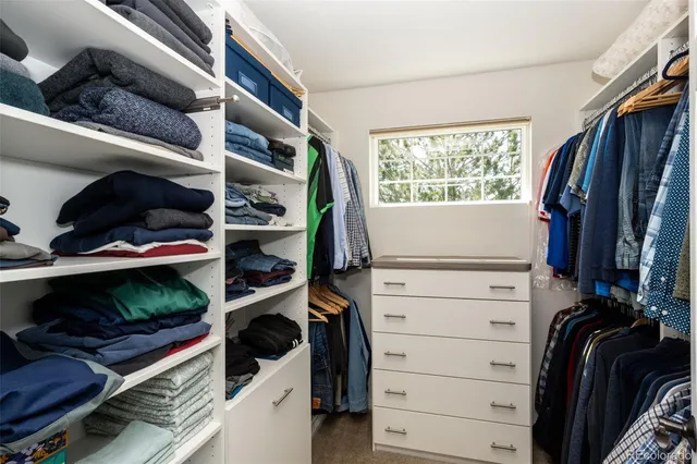 a room with gym equipment and a window