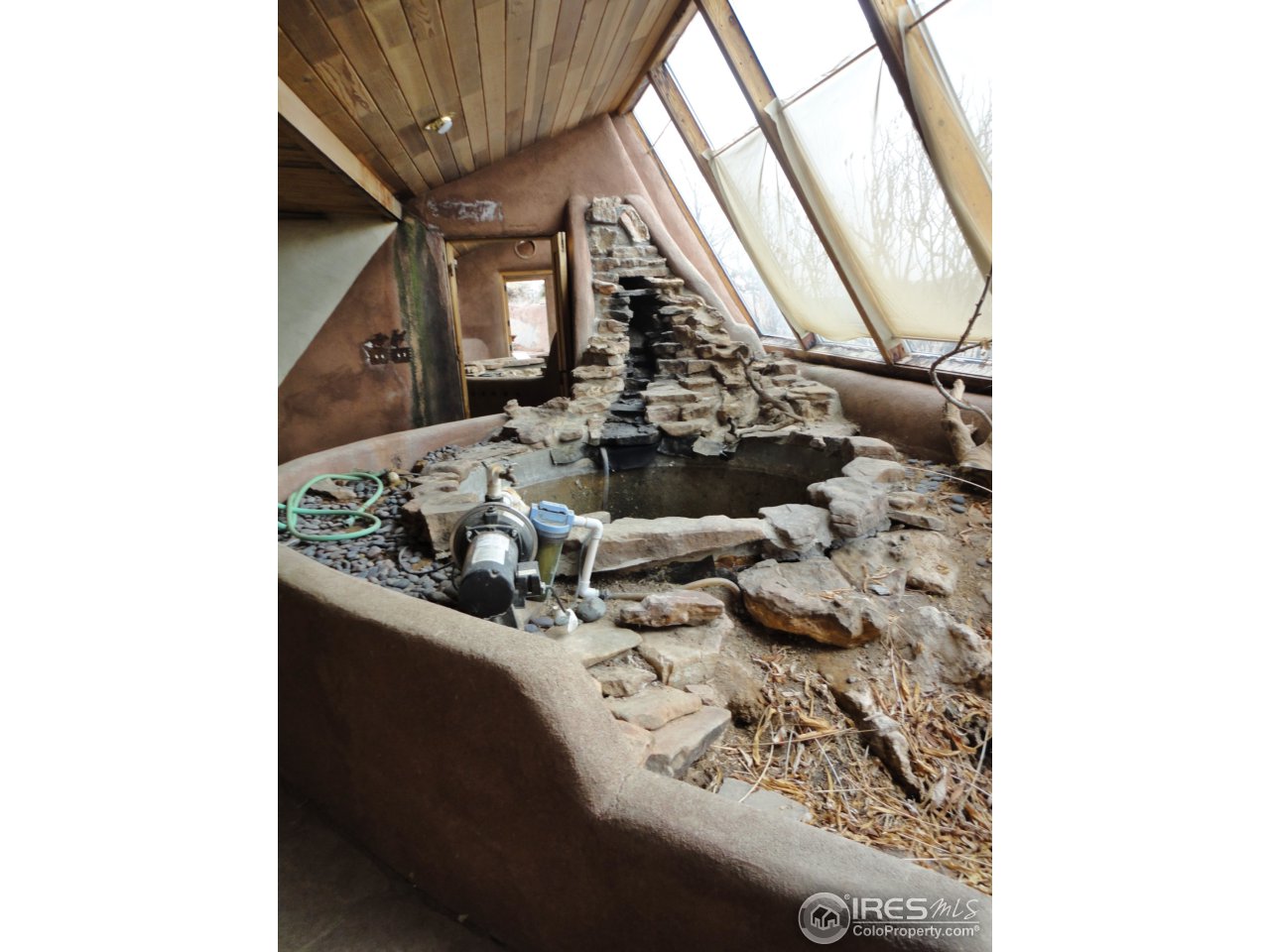 1736 West Trilby Road Fort Collins, CO 80526 - Photo 7 of 33 earthship