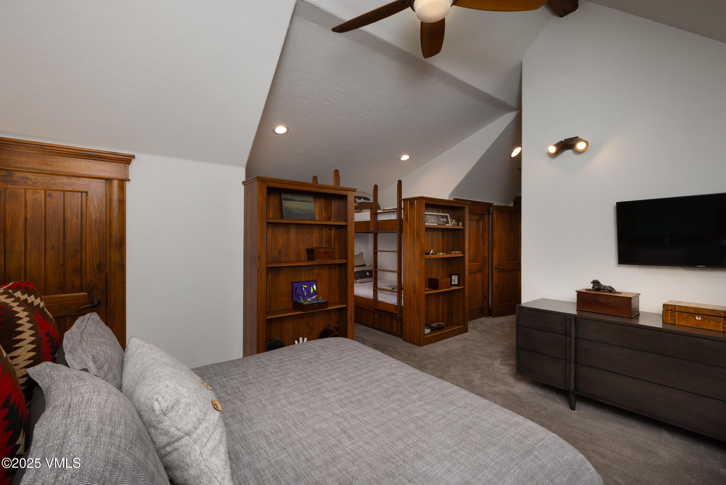 1761 Paintbrush Avon, CO 81620 - Photo 13 of 23 a living room with furniture and a flat screen tv