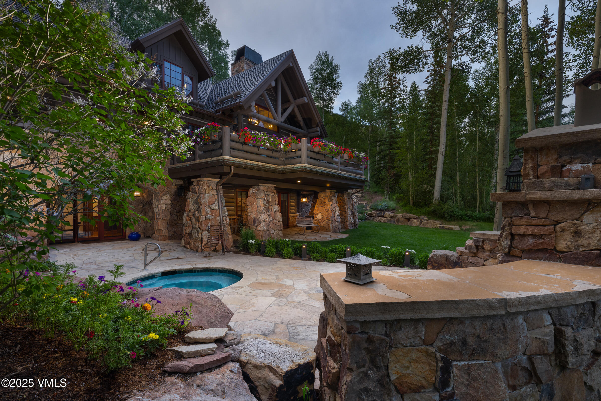 1761 Paintbrush Avon, CO 81620 - Photo 19 of 23 a view of a table and chairs in backyard of the house