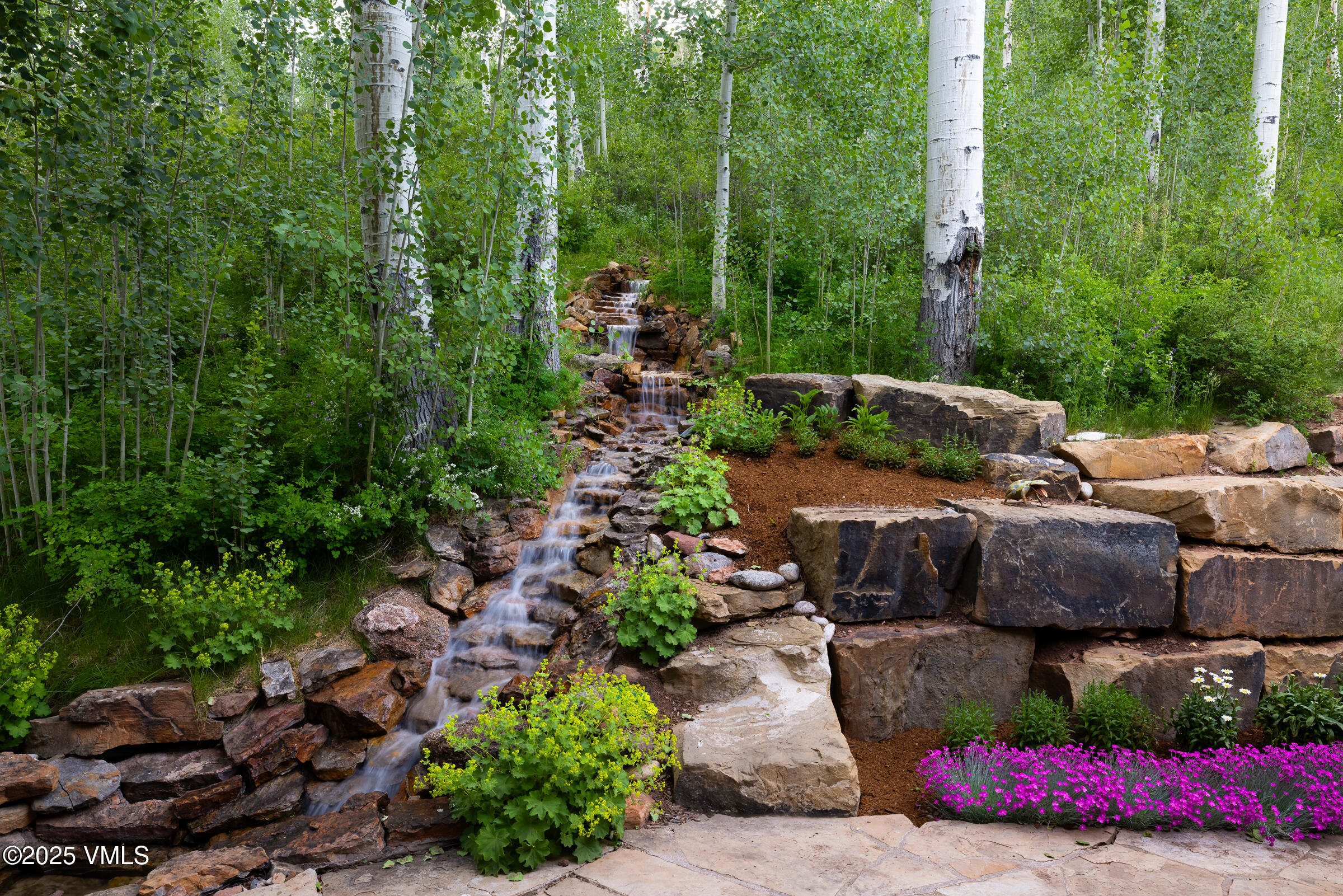 1761 Paintbrush Avon, CO 81620 - Photo 23 of 23 a view of garden with patio and outdoor seating