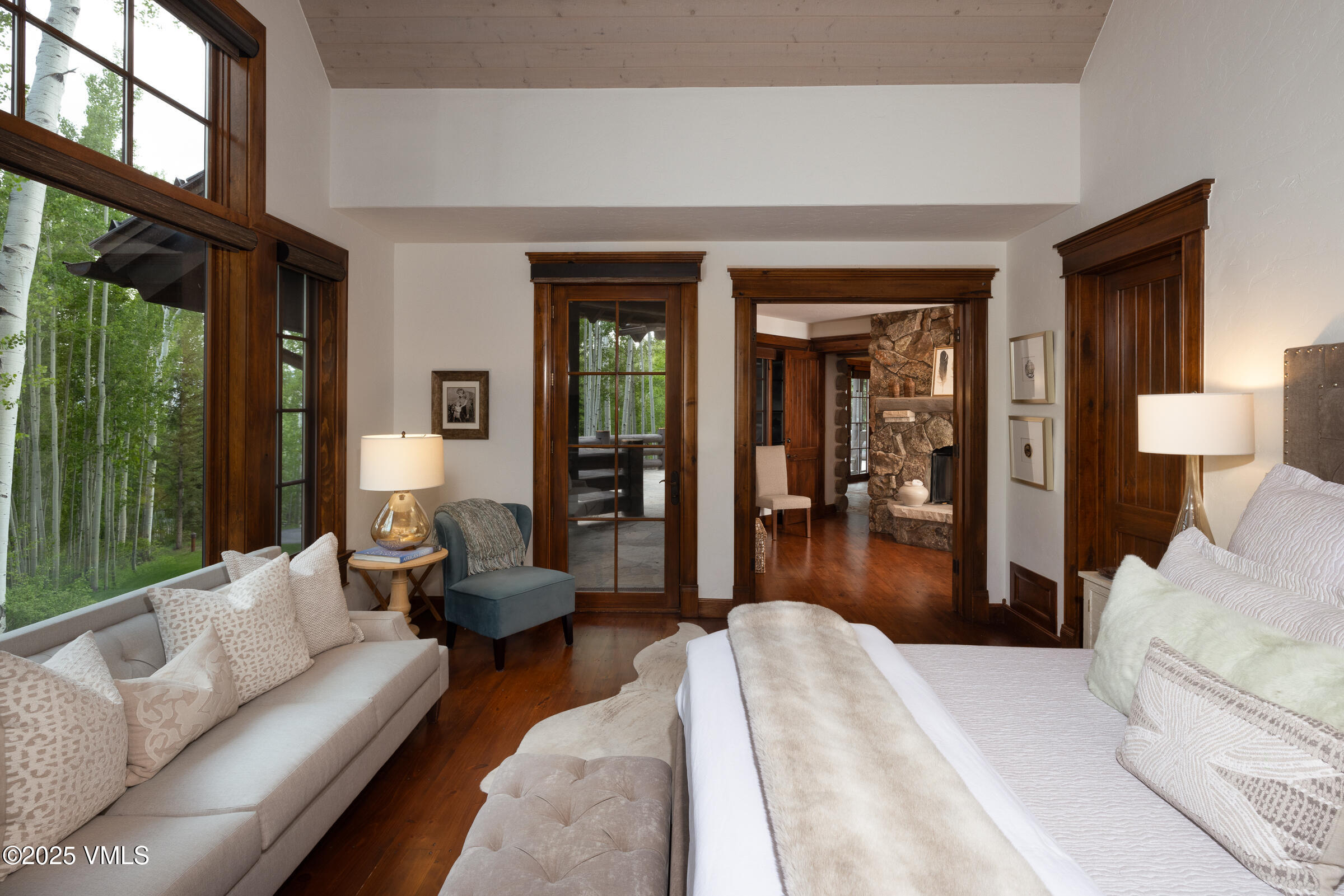 1761 Paintbrush Avon, CO 81620 - Photo 9 of 23 a bedroom with furniture and a large window