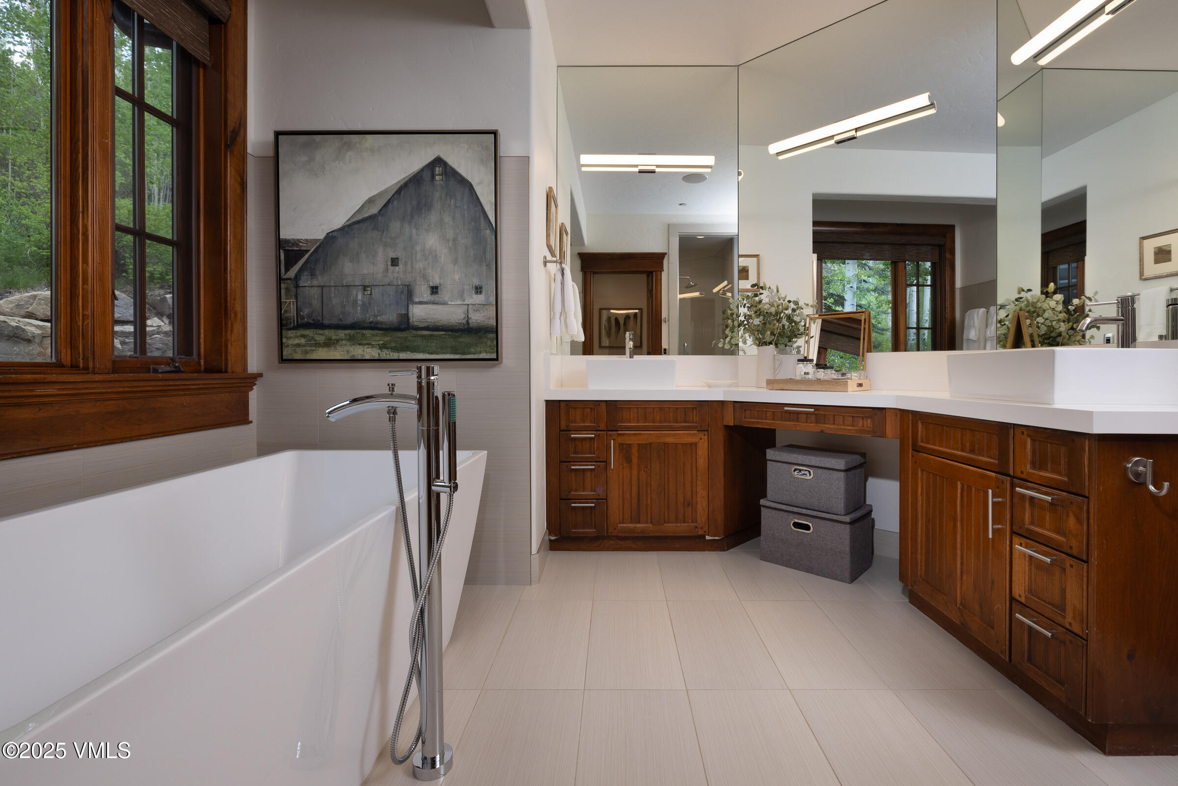 1761 Paintbrush Avon, CO 81620 - Photo 10 of 23 a bathroom with a tub sink and mirror