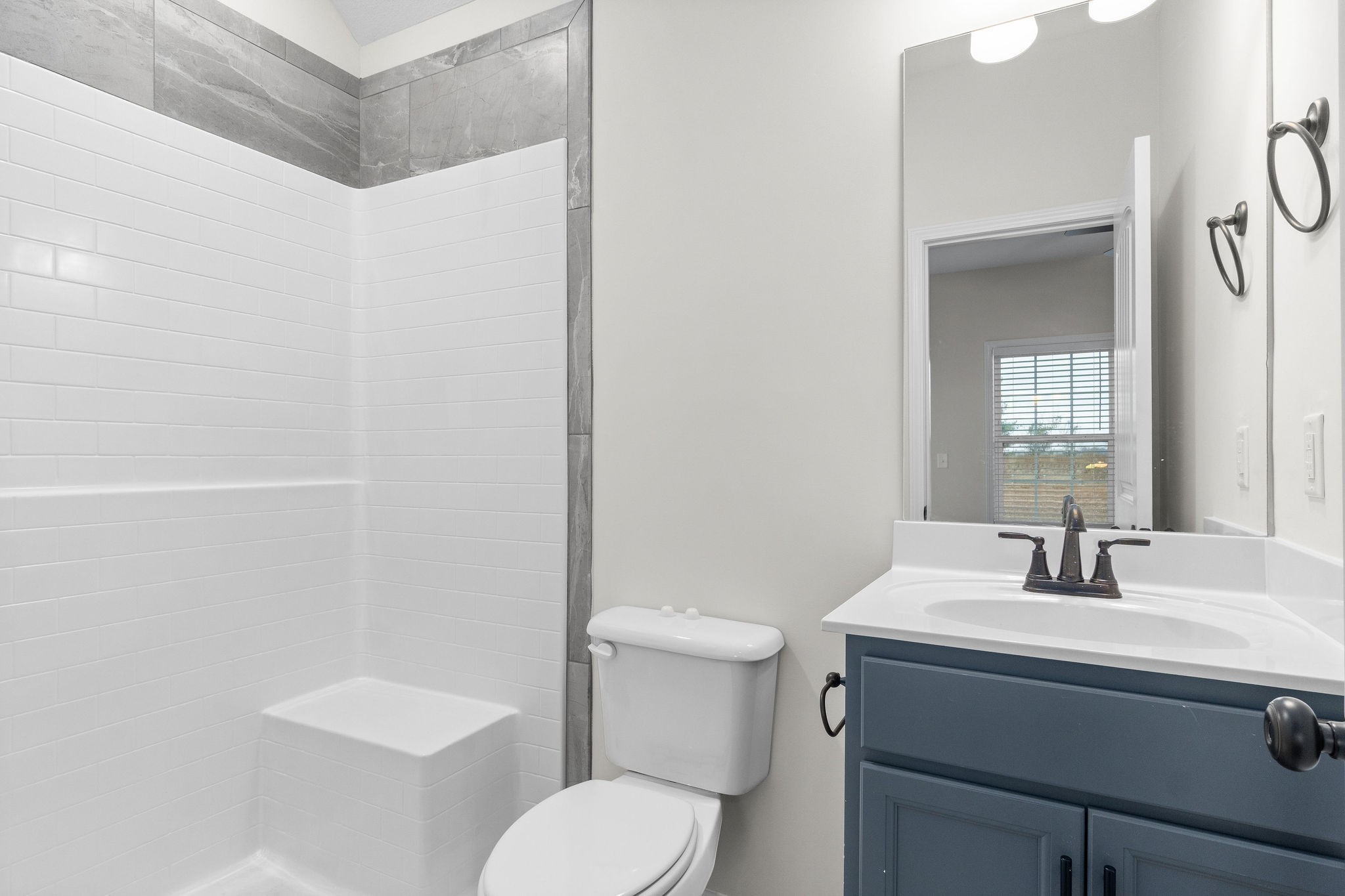 3350 Allen Road, Unit 20C Clarksville, TN 37042 - Photo 21 of 28 a bathroom with a sink toilet and mirror