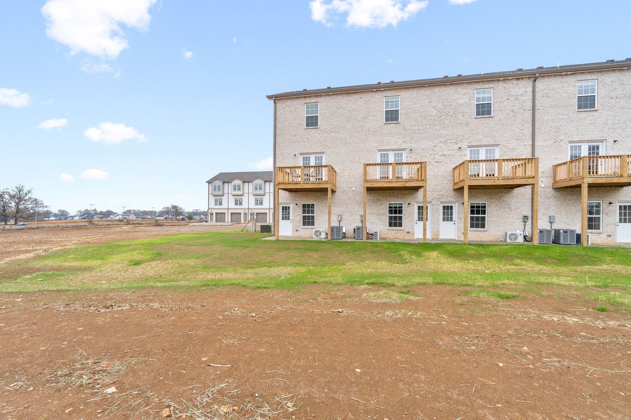 3350 Allen Road, Unit 20C Clarksville, TN 37042 - Photo 28 of 28 a view of a big house with a big yard and large trees