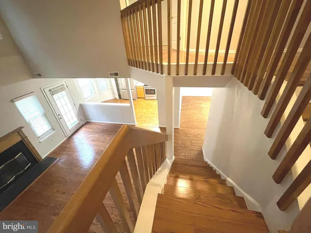 a view of bedroom and wooden floor