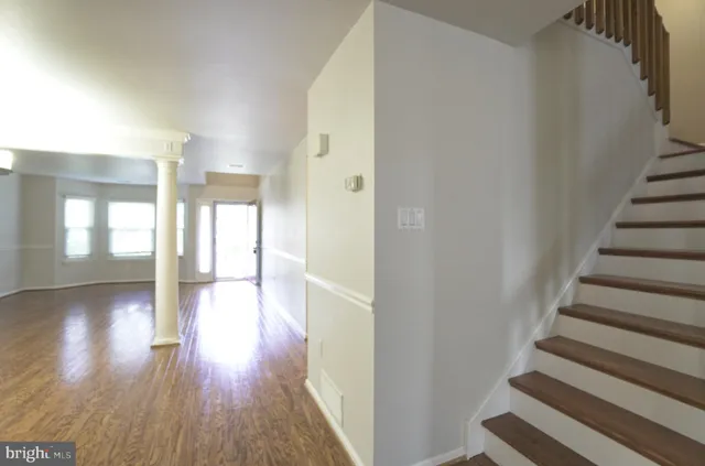 a view of entryway with wooden floor