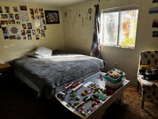 1785 Brigman Street Anderson, CA 96007 - Photo 6 of 13 a bedroom with a bed and a window