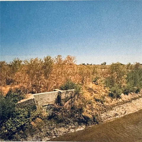 a view of a large building with a mountain in the background
