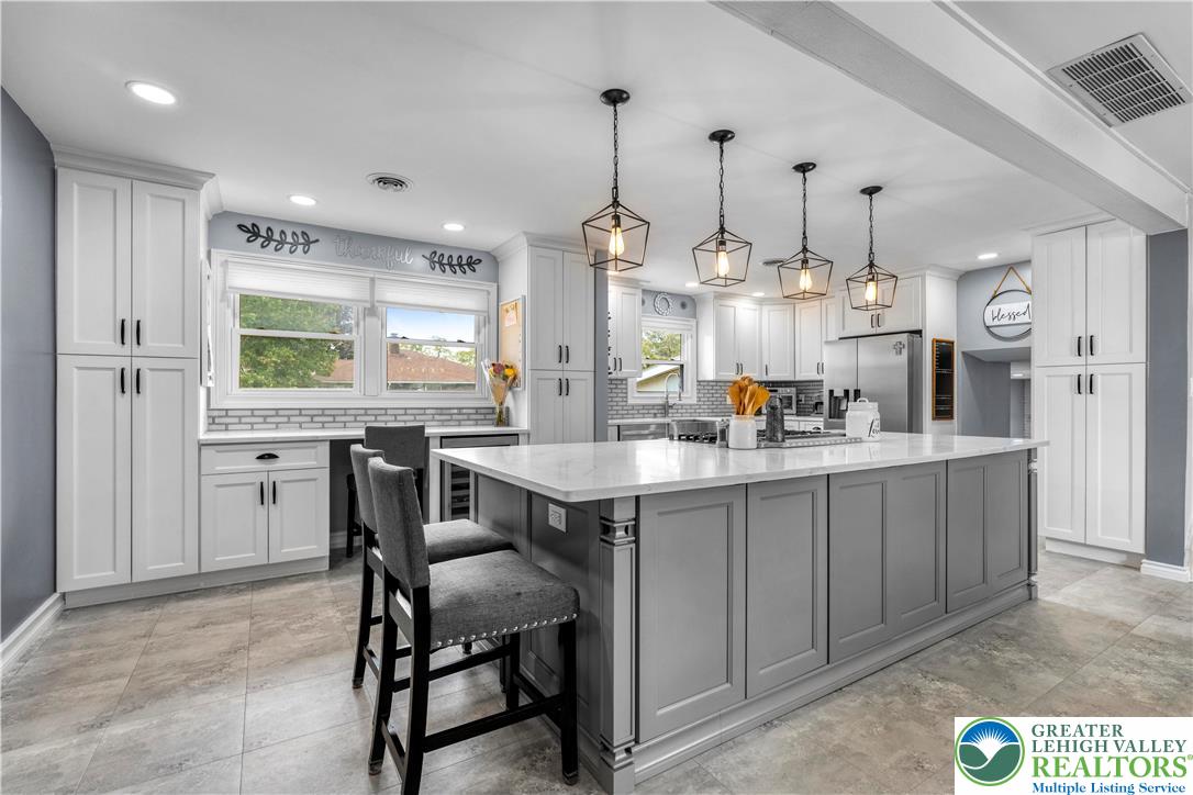 3340 Bridlepath Road Easton, PA 18045 - Photo 12 of 52 a kitchen with counter top space cabinets and appliances