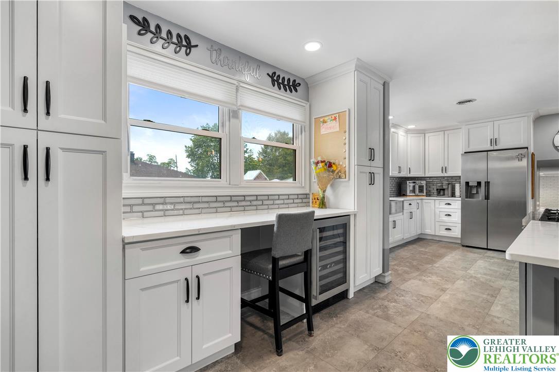 3340 Bridlepath Road Easton, PA 18045 - Photo 15 of 52 a kitchen with white cabinets and white appliances