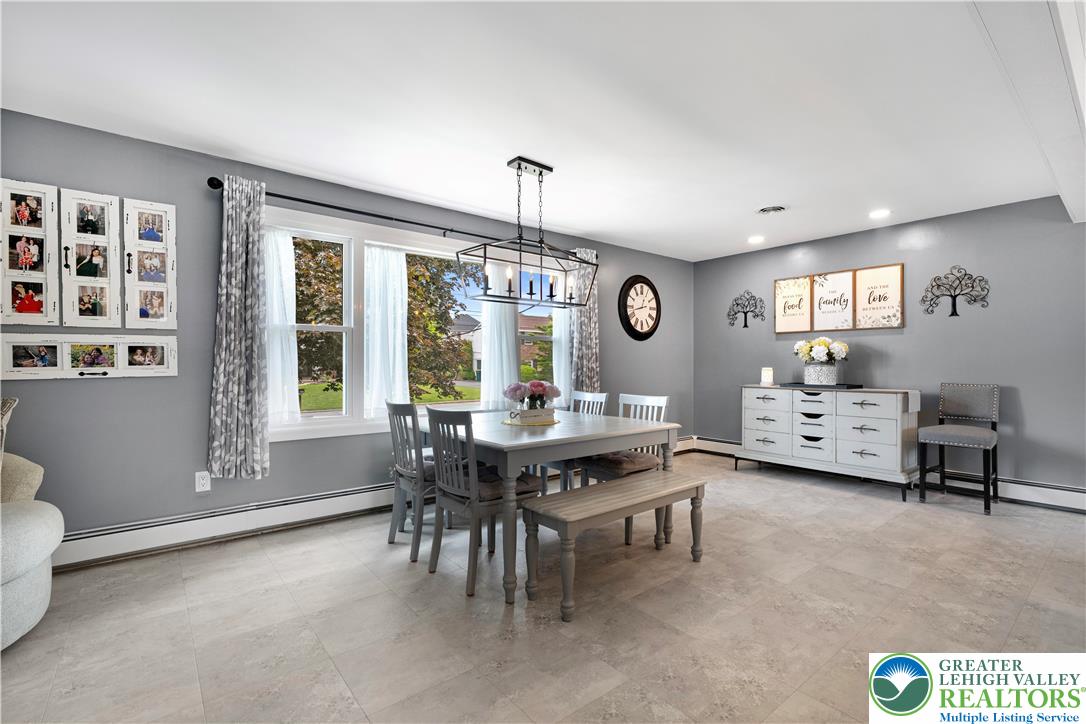 3340 Bridlepath Road Easton, PA 18045 - Photo 17 of 52 a view of a dining room with furniture and window