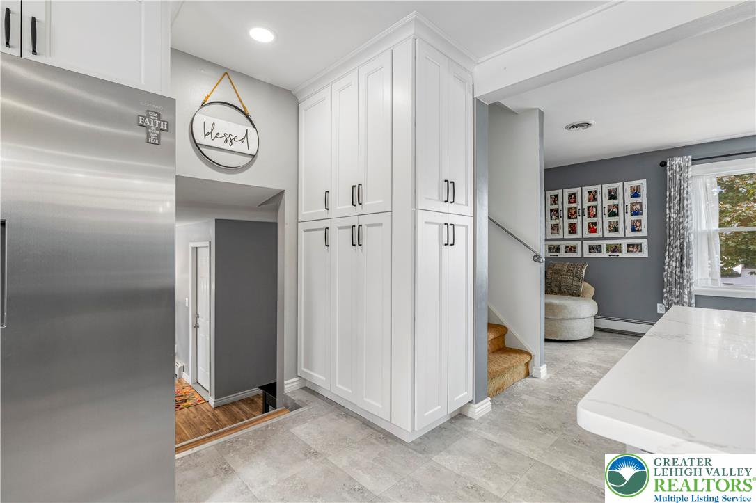 3340 Bridlepath Road Easton, PA 18045 - Photo 20 of 52 a view of a hallway with elevator and glass door