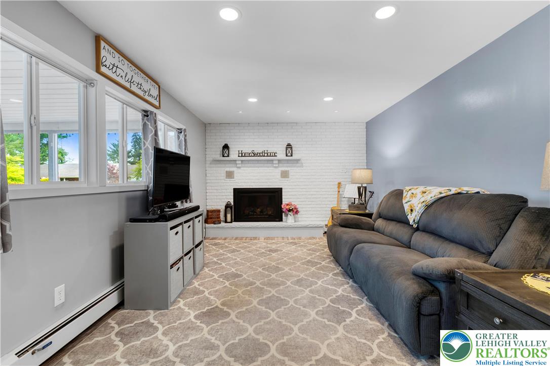 3340 Bridlepath Road Easton, PA 18045 - Photo 23 of 52 a living room with furniture and a flat screen tv