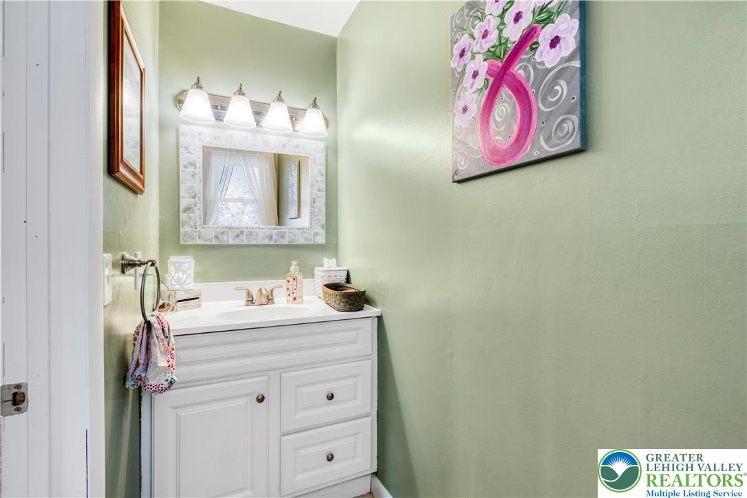 3340 Bridlepath Road Easton, PA 18045 - Photo 26 of 52 a bathroom with a sink mirror and vanity