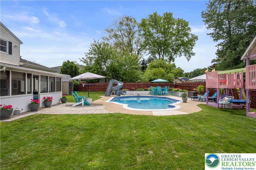 3340 Bridlepath Road Easton, PA 18045 - Photo 31 of 52 a view of a house with swimming pool and sitting area