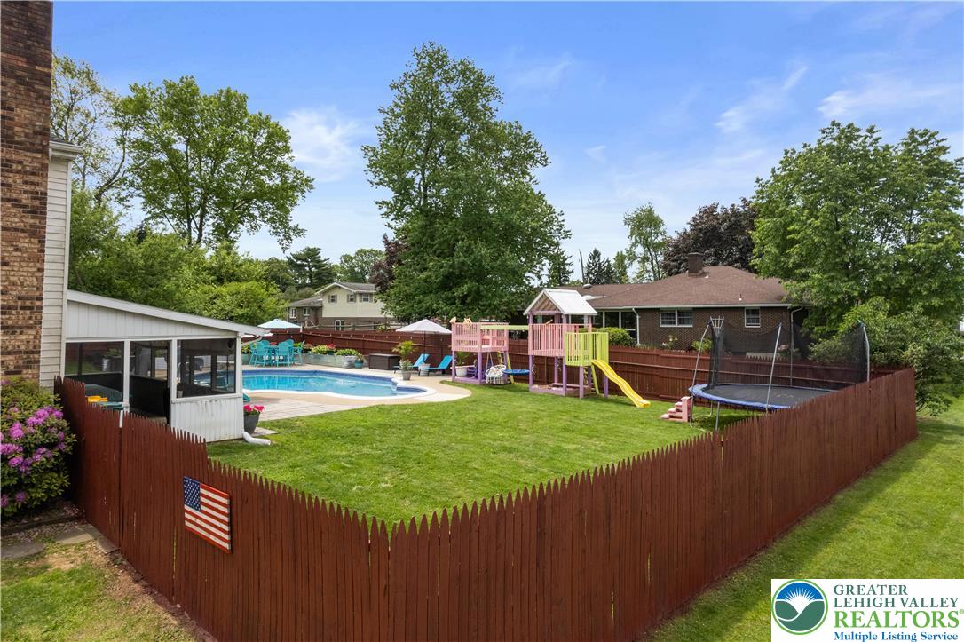 3340 Bridlepath Road Easton, PA 18045 - Photo 32 of 52 swimming pool view with a seating space and a garden view