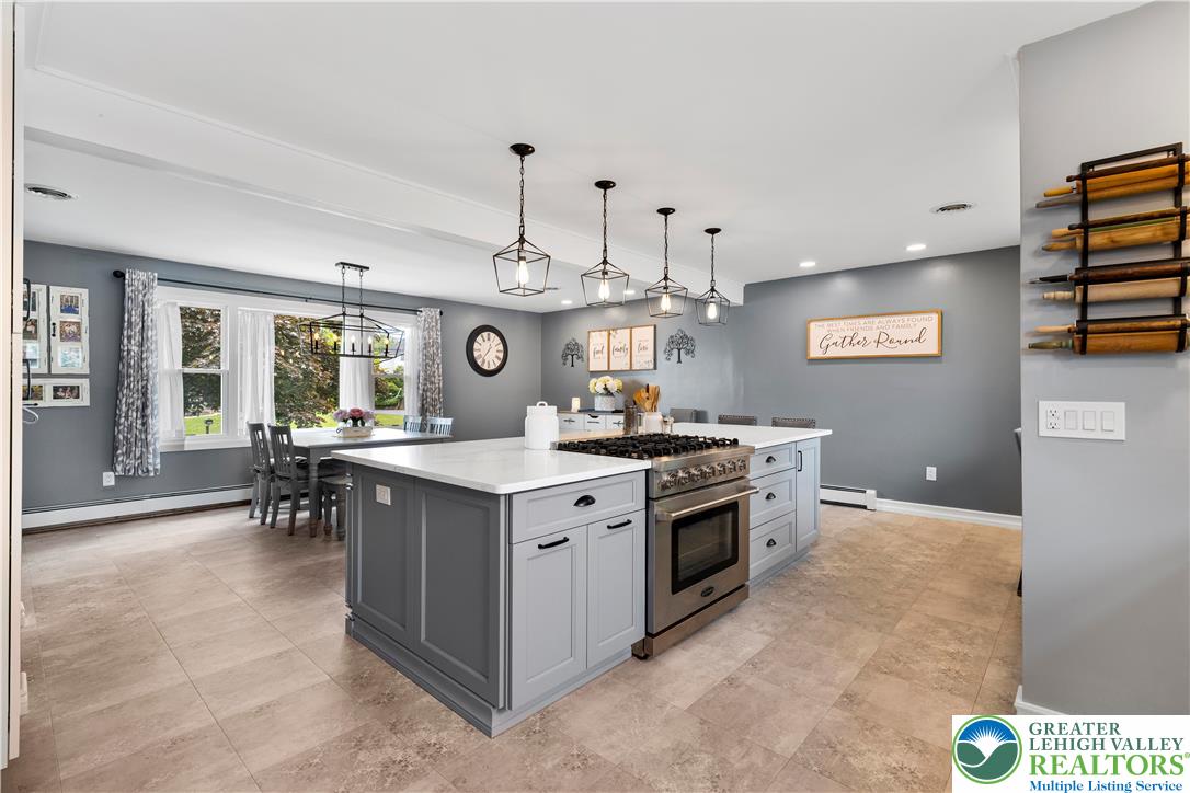 3340 Bridlepath Road Easton, PA 18045 - Photo 10 of 52 a kitchen with a stove and a table