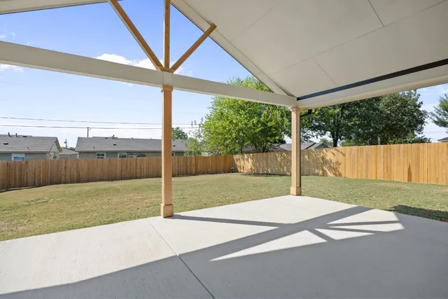 a swimming pool with a yard