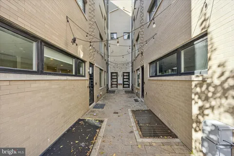 a view of a pathway with a building