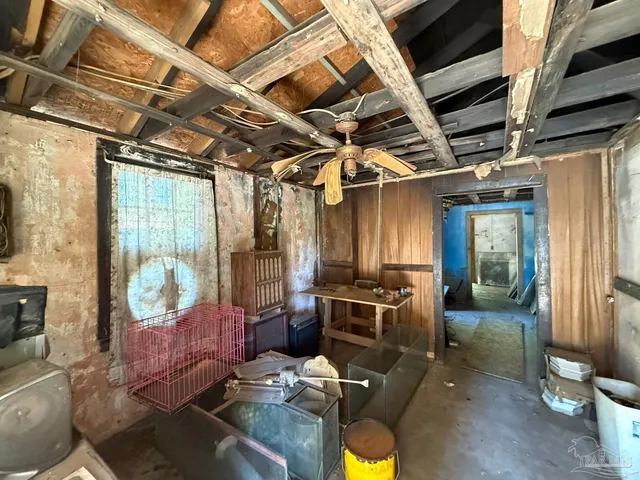 a room with furniture and a window