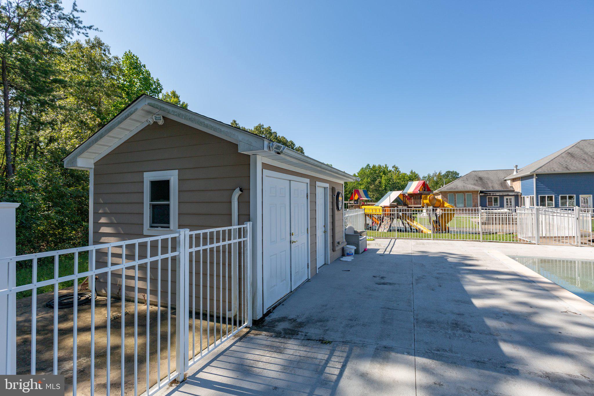 59 Caisson Road Fredericksburg, VA 22405 - Photo 54 of 150 Pool house with small kitchen and half bath