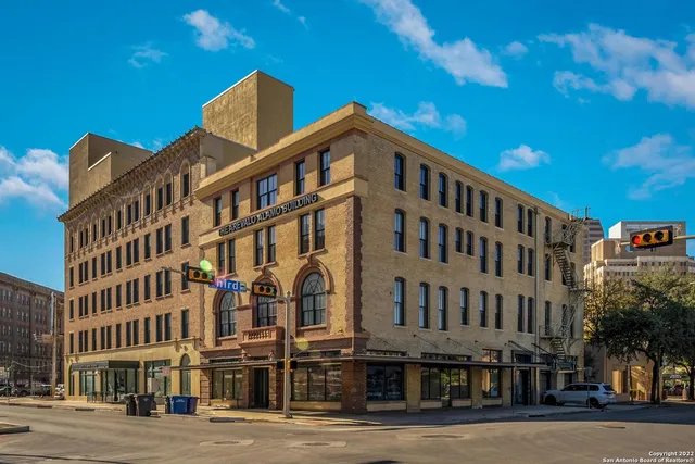 a view of a building with a street