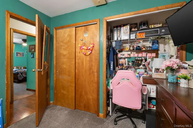 a workspace with furniture and a window