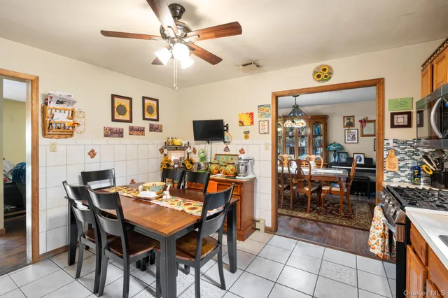 a view of a dining room with furniture