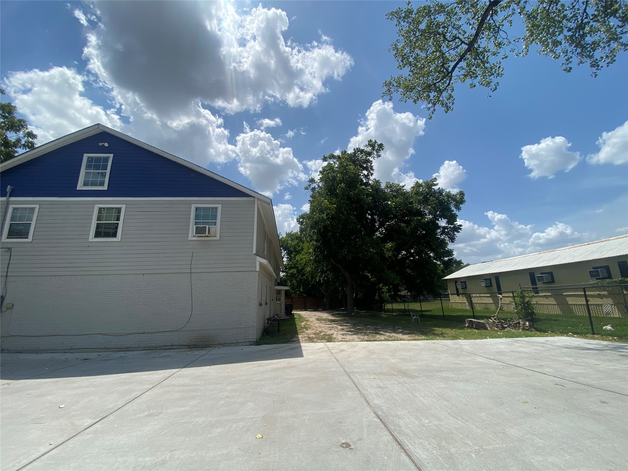 5301 Collingsworth Street, Unit 8 Houston, TX 77026 - Photo 2 of 8 a view of a house with a yard