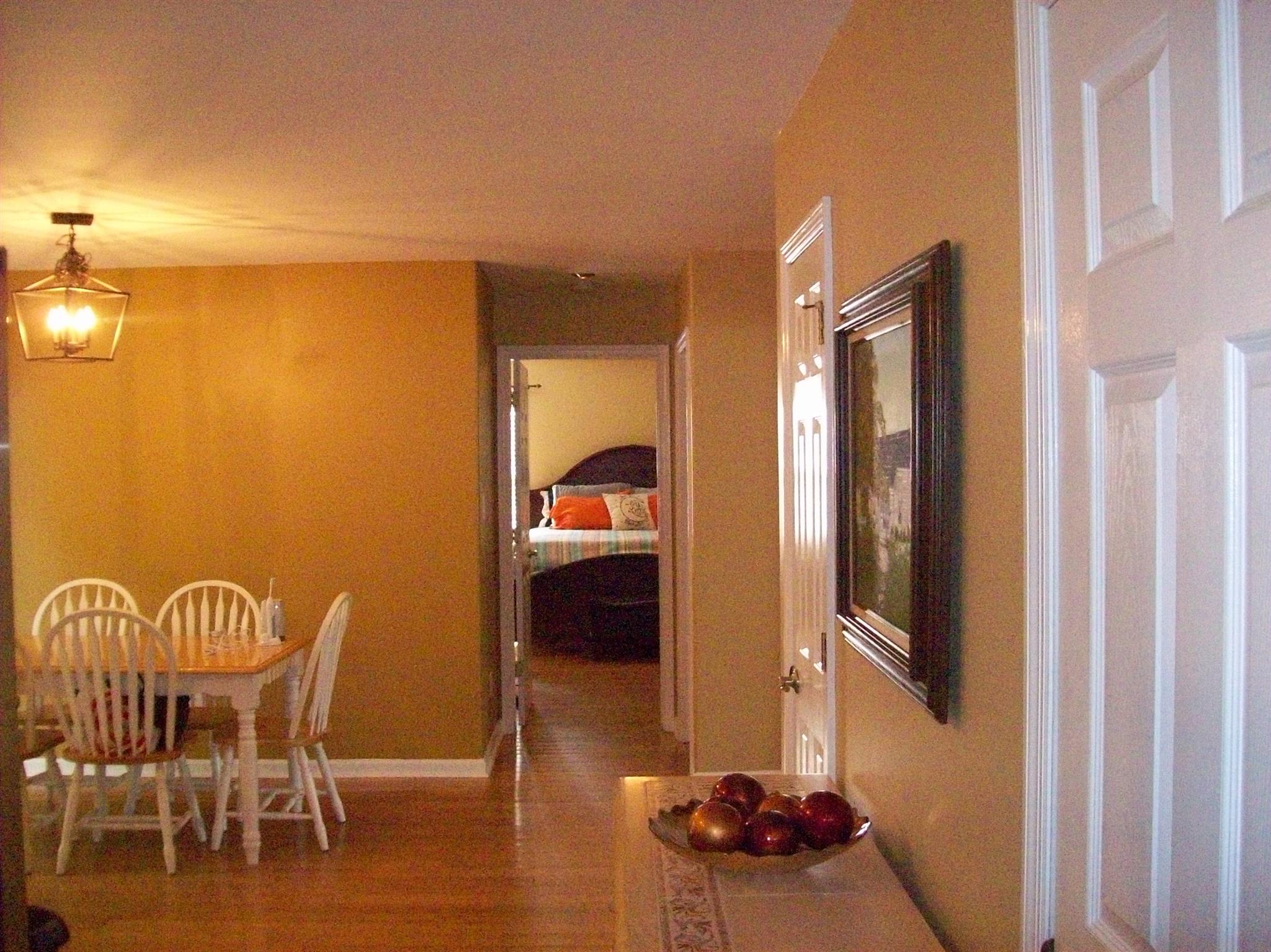 3637 Rutherford Drive Spring Hill, TN 37174 - Photo 13 of 25 a view of a dining room with furniture wooden floor and a carpet