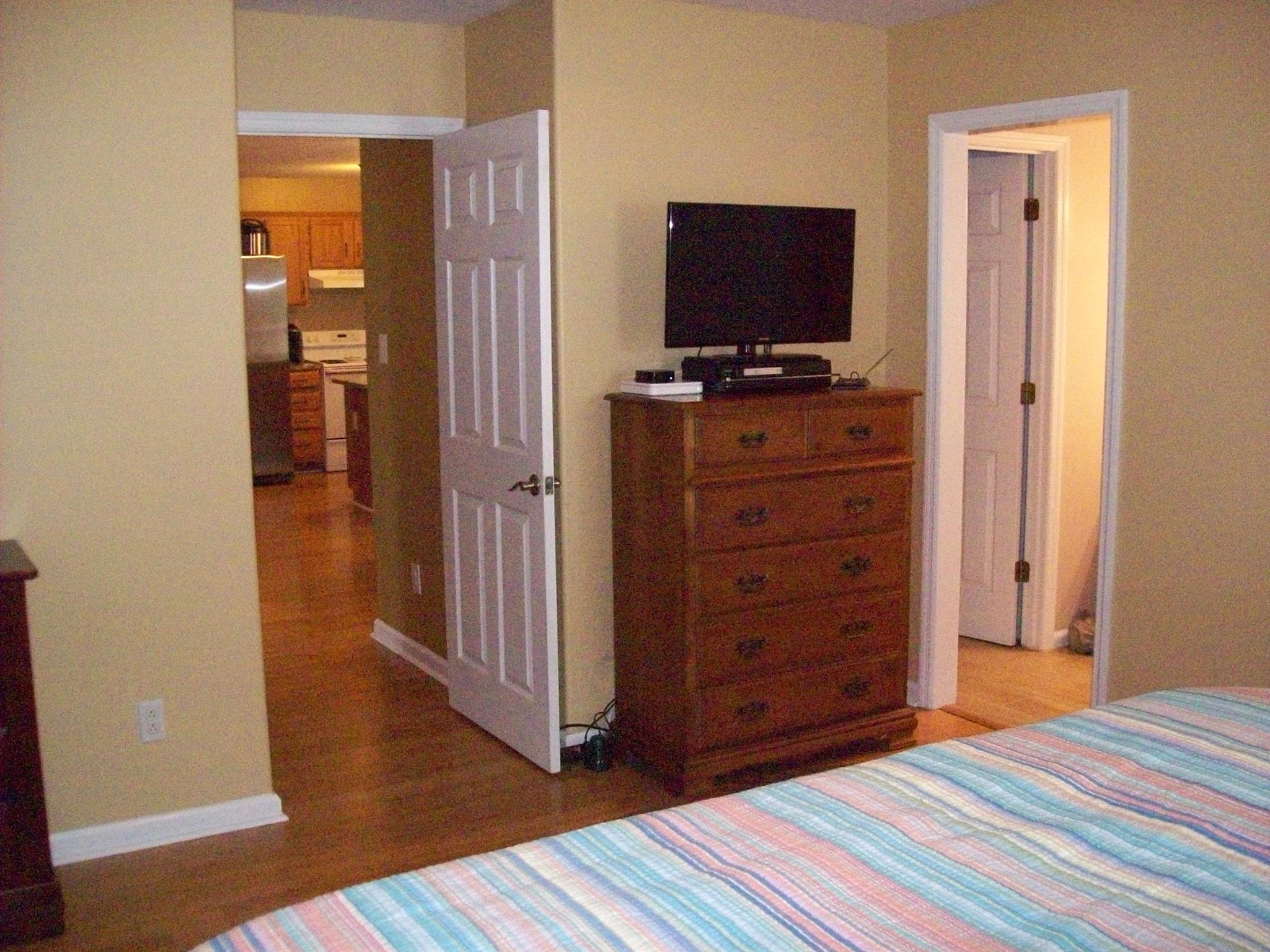 3637 Rutherford Drive Spring Hill, TN 37174 - Photo 14 of 25 a view of a bedroom with wooden floor and closet