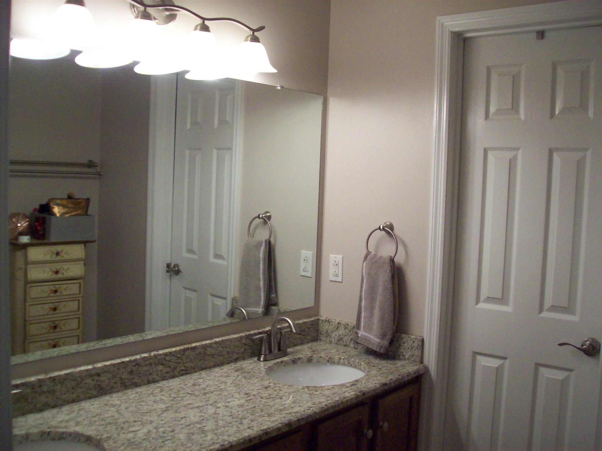 3637 Rutherford Drive Spring Hill, TN 37174 - Photo 16 of 25 a bathroom with a granite countertop sink and a mirror