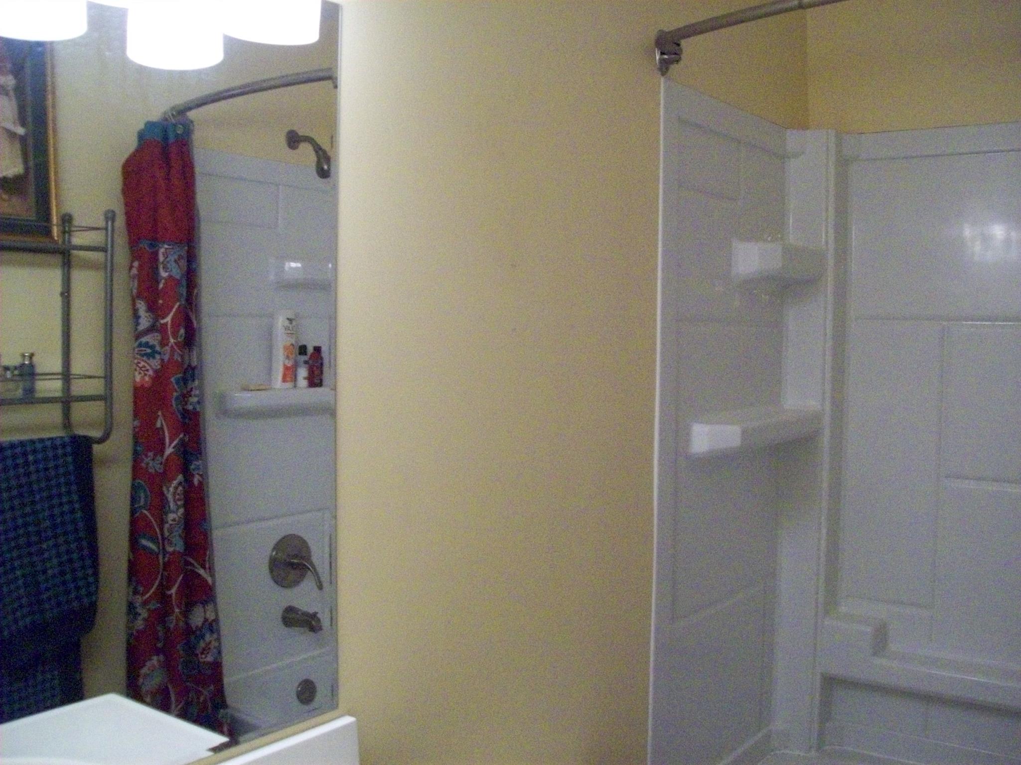 3637 Rutherford Drive Spring Hill, TN 37174 - Photo 21 of 25 a bathroom with a toilet and shower