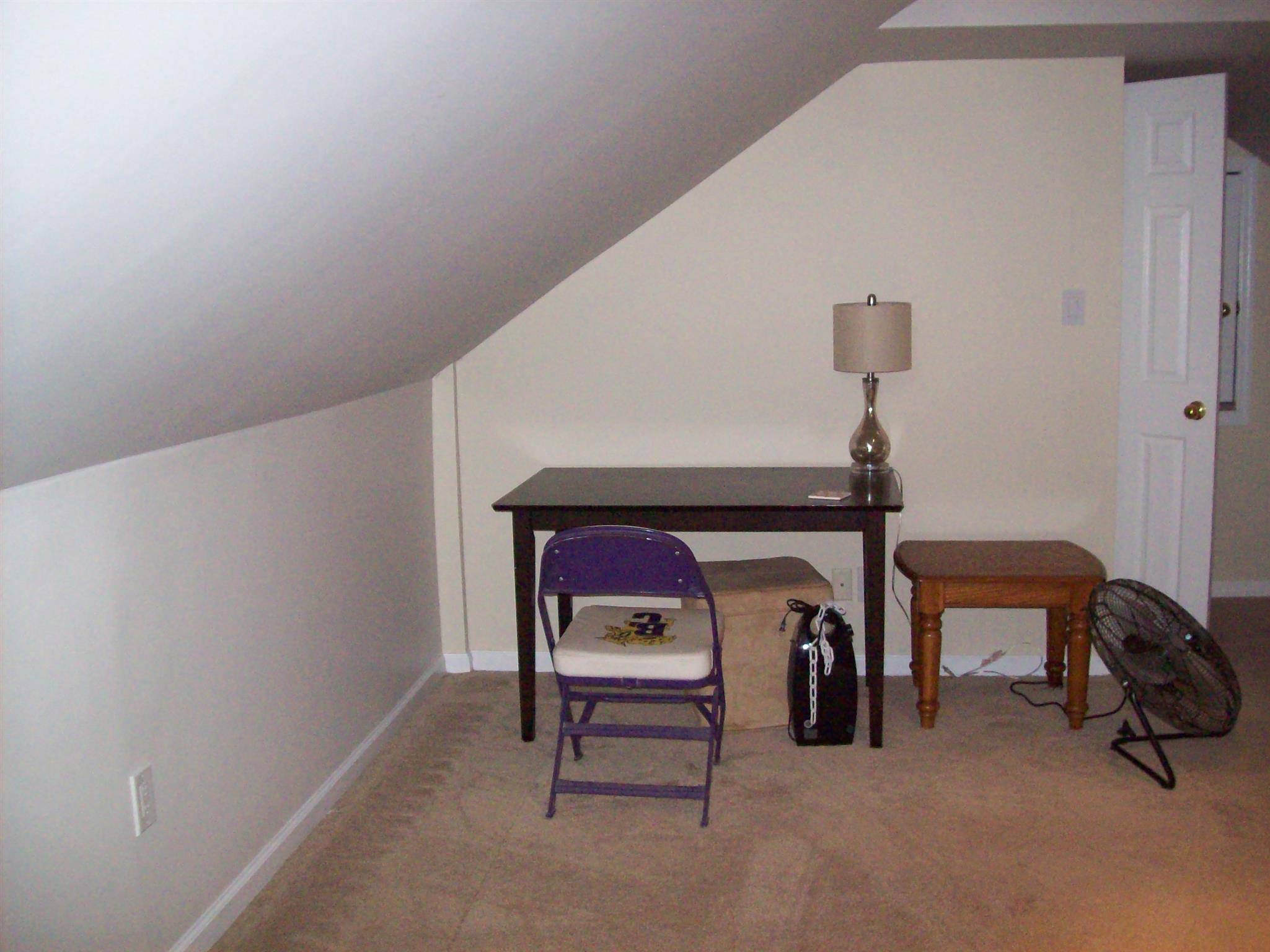 3637 Rutherford Drive Spring Hill, TN 37174 - Photo 23 of 25 a room with furniture and a lamp